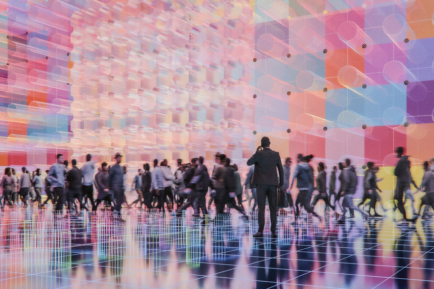 crowd of people walking through a rendered, futuristic setting